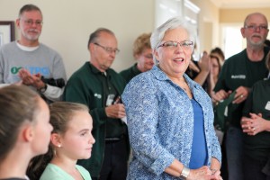 Jeanne DeMarsico thanks everyone at her house blessing on the third anniversary of Sandy