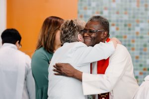 annual conference 2019, ordination, hug, embrace