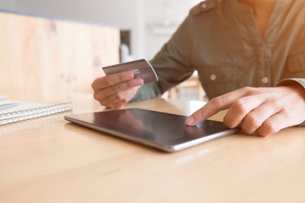 woman shopping online with laptop and credit card, sale and shop